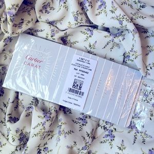 LOT OF 12 CARTIER CARAT